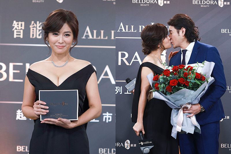 【車勢星聞】葉家妤出席娘家蓓朵娜「超級保養系列」發表會擔任品牌代言人,陳宇風也帶著玫瑰花束親喜現身在台上親吻放閃。(圖:民視提供)