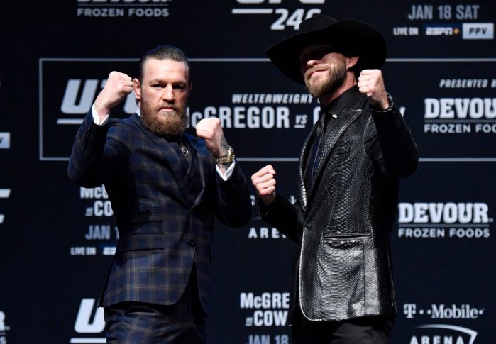 UFC 246:イベント前記者会見でフェイスオフに臨んだコナー・マクレガーとドナルド・セラーニ【アメリカ・ネバダ州ラスベガス/2020年1月15日(Photo by Jeff Bottari/Zuffa LLC via Getty Images)】
