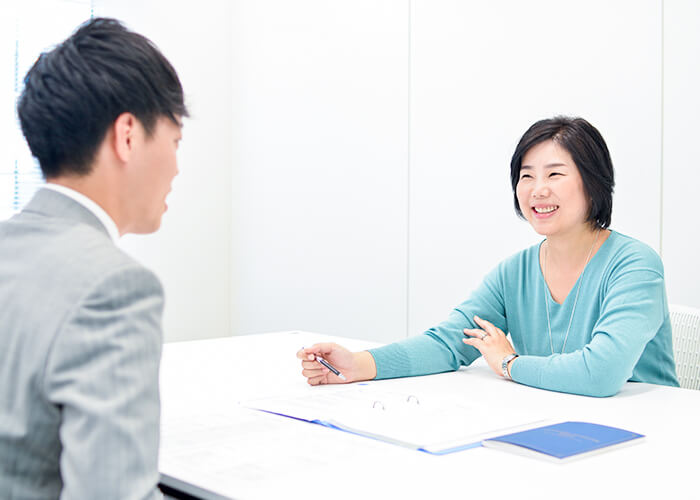 開業のきっかけを話す石塚さん。